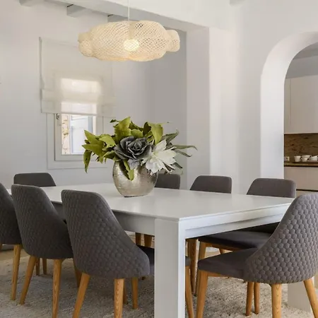 With Traditional Cycladic Charm