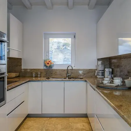 With Traditional Cycladic Charm *
